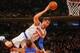 Jan 22, 2014; New York, NY, USA; New York Knicks center Andrea Bargnani (77) drives to the basket and is fouled by Philadelphia 76ers power forward Thaddeus Young (21) during the second half at Madison Square Garden. Philadelphia 76ers defeat the New Yor
