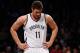 NEW YORK, NY - DECEMBER 12: Brook Lopez #11 of the Brooklyn Nets looks on during the first half against the Los Angeles Clippers at Barclays Center on December 12, 2013 in the Brooklyn borough of New York City. NOTE TO USER: User expressly acknowledges a