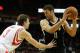 HOUSTON, TX - NOVEMBER 29: Brook Lopez #11 of the Brooklyn Nets works the ball against Omer Asik #3 of the Houston Rockets during the game at Toyota Center on November 29, 2013 in Houston, Texas. NOTE TO USER: User expressly acknowledges and agrees that,