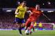 LIVERPOOL, ENGLAND - MARCH 26: Daniel Agger of Liverpool challenges Emanuele Giaccherini of Sunderland during the Barclays Premier League match between Liverpool and Sunderland at Anfield on March 26, 2014 in Liverpool, England. (Photo by Michael Regan/