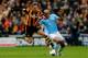 HULL, ENGLAND - MARCH 15: Nikica Jelavic of Hull City clashes with Vincent Kompany of Manchester City during the Barclays Premier league match between Hull City and Manchester City at KC Stadium on March 15, 2014 in Hull, England. (Photo by Paul Thomas/G
