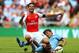 LONDON, ENGLAND - AUGUST 10: Mikel Arteta of Arsenal clashes with David Silva of Manchester City during the FA Community Shield match between Manchester City and Arsenal at Wembley Stadium on August 10, 2014 in London, England. (Photo by Clive Mason/Gett