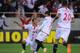 SEVILLE, SPAIN - APRIL 24: Carlos Bacca (L) of Sevilla FC celebrates with Jose Reyes after scoring Sevilla's 2nd goal during the UEFA Europa League Semi Final first leg match between Sevilla FC and Valencia CF at Estadio Ramon Sanchez Pizjuan on April
