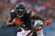 CHICAGO, IL - AUGUST 08: Brandon Marshall #15 of the Chicago Bears fights to break a tackle by Nate Allen #29 of the Philadelphia Eagles during a preseason game at Soldier Field on August 8, 2014 in Chicago, Illinois. (Photo by Jonathan Daniel/Getty Image