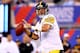 EAST RUTHERFORD, NJ - AUGUST 09: Quarterback Ben Roethlisberger #7 of the Pittsburgh Steelers drops back to pass against the New York Giants during a preseason game at MetLife Stadium on August 9, 2014 in East Rutherford, New Jersey. (Photo by Elsa/Gett