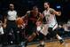Mar 10, 2014; Brooklyn, NY, USA; Toronto Raptors point guard Kyle Lowry (7) drives past Brooklyn Nets point guard Deron Williams (8) during the first quarter at the Barclays Center. Mandatory Credit: Adam Hunger-USA TODAY Sports