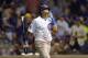 CHICAGO, IL - AUGUST 11: Javier Baez #9 of the Chicago Cubs walks back to the dugout after striking out during the eighth inning against the Milwaukee Brewers at Wrigley Field on August 11, 2014 in Chicago, Illinois. (Photo by Brian Kersey/Getty Images)