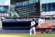 NEW YORK, NY - AUGUST 09: Derek Jeter #2 of the New York Yankees walks back to first base after running out a sixth inning infield base hit against the Cleveland Indians at Yankee Stadium on August 9, 2014 in the Bronx borough of New York City. The hit wa