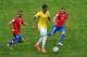BELO HORIZONTE, BRAZIL - JUNE 28: Luiz Gustavo of Brazil controls the ball against Felipe Gutierrez (L) and Marcelo Diaz of Chile during the 2014 FIFA World Cup Brazil round of 16 match between Brazil and Chile at Estadio Mineirao on June 28, 2014 in Belo