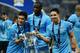 LONDON, ENGLAND - MARCH 02: (L-R) Jesus Navas, Yaya Toure and Samir Nasri of Manchester City pose with the trophy after the Capital One Cup Final between Manchester City and Sunderland at Wembley Stadium on March 2, 2014 in London, England. (Photo by Ja