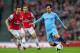 LONDON, ENGLAND - MARCH 29: David Silva of Manchester City breaks with the ball during the Barclays Premier League match between Arsenal and Manchester City at Emirates Stadium on March 29, 2014 in London, England. (Photo by Shaun Botterill/Getty Images