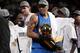 MIAMI, FL - JUNE 12: Shawn Marion of the Dallas Mavericks celebrates with the Larry O'Brien Championship trophy after the Mavericks won 105-95 against the Miami Heat in Game Six of the 2011 NBA Finals at American Airlines Arena on June 12, 2011 in Miami,