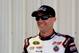 LONG POND, PA - AUGUST 02: Kevin Harvick, driver of the #4 Mobil 1 Chevrolet, smiles from in the garage during practice for the NASCAR Sprint Cup Series GoBowling.com 400 at Pocono Raceway on August 2, 2014 in Long Pond, Pennsylvania. (Photo by Jerry Ma