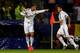 CARDIFF, WALES - AUGUST 12: (L-R) Cristiano Ronaldo of Real Madrid celebrates with teammate James Rodriguez after scoring their team's second goal during the UEFA Super Cup between Real Madrid and Sevilla FC at Cardiff City Stadium on August 12, 2014 in