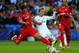 CARDIFF, WALES - AUGUST 12: Grzegorz Krychowiak of Sevilla and Luka Modric of Real Madrid battle for the ball during the UEFA Super Cup between Real Madrid and Sevilla FC at Cardiff City Stadium on August 12, 2014 in Cardiff, Wales. (Photo by Clive Maso