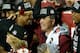 PASADENA, CA - JANUARY 06: Florida State Seminoles head coach Jimbo Fisher (R) holds the Coaches' Trophy as quarterback Jameis Winston (L) #5 looks on after defeating the Auburn Tigers 34-31 in the 2014 Vizio BCS National Championship Game at the Rose Bo
