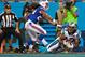 CHARLOTTE, NC - AUGUST 08: Kelvin Benjamin #13 of the Carolina Panthers makes a touchdown catch as Stephon Gilmore #24 of the Buffalo Bills defends during their game at Bank of America Stadium on August 8, 2014 in Charlotte, North Carolina. (Photo by Gr