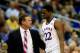 KANSAS CITY, MO - MARCH 14: Andrew Wiggins #22 of the Kansas Jayhawks walks off the court past head coach Bill Self during the Big 12 Basketball Tournament semifinal game against the Iowa State Cyclones at Sprint Center on March 14, 2014 in Kansas City,