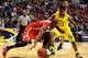 INDIANAPOLIS, IN - MARCH 15: Shannon Scott #3 of the Ohio State Buckeyes tries to keep controls of the ball against Derrick Walton Jr. #10 of the Michigan Wolverines during the first half of the Big Ten Basketball Tournament Semifinal game at Bankers Lif