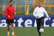 ROME - MARCH 31: Sir Alex Ferguson, the manager of Manchester United, controls the ball as Cristiano Ronaldo looks on during the Manchester United training session held at the Olympic Stadium on March 31, 2008 in Rome, Italy. Manchester United play Roma