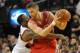 PORTLAND, OR - APRIL 27: Wesley Matthews #2 of the Portland Trail Blazers reaches in on Chandler Parsons #25 of the Houston Rockets in the fourth quarter of Game Four of the Western Conference Quarterfinals during the 2014 NBA Playoffs at the Moda Center