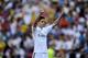 MADRID, SPAIN - JULY 22: James Rodriguez waves to fans during his unveiling as a new Real Madrid player at the Santaigo Bernabeu stadium on July 22, 2014 in Madrid, Spain. Real agreed to buy Rodriguez from AS Monaco for the next six seasons for an undisc