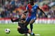 LONDON, ENGLAND - APRIL 27: Yannick Bolasie of Crystal Palace is tackled by Javi Garcia of Manchester City during the Barclays Premier League match between Crystal Palace and Manchester City at Selhurst Park on April 27, 2014 in London, England. (Photo