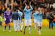 HULL, ENGLAND - MARCH 15: Javi Garcia and Pablo Zabaleta of Manchester City applaud the travelling fans following their team's 2-0 victory during the Barclays Premier league match between Hull City and Manchester City at KC Stadium on March 15, 2014 in H