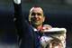 LIVERPOOL, ENGLAND - MAY 03: Manager Roberto Martinez of Everton waves to the fans with his daughter at the end of the Barclays Premier League match between Everton and Manchester City at Goodison Park on May 3, 2014 in Liverpool, England. (Photo by Cli