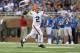 DETROIT, MI - AUGUST 09: Quarterback Johnny Manziel #2 of the Cleveland Browns rolls out to pass during the third quarter of the preseason game against the Detroit Lions at Ford Field on August 9, 2014 in Detroit, Michigan. The Lions defeated the Browns