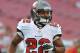 TAMPA, FL - AUGUST 29: Running back Doug Martin #22 of the Tampa Bay Buccaneers warms up for play against the Washington Redskins August 29, 2013 at Raymond James Stadium in Tampa, Florida. (Photo by Al Messerschmidt/Getty Images)