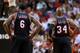 MIAMI, FL - JANUARY 26: LeBron James #6 and Ray Allen #34 of the Miami Heat look on during a game against the San Antonio Spurs at American Airlines Arena on January 26, 2014 in Miami, Florida. NOTE TO USER: User expressly acknowledges and agrees that, by