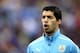 SAO PAULO, BRAZIL - JUNE 19: Luis Suarez of Uruguay sings the National Anthem before the 2014 FIFA World Cup Brazil Group D match between Uruguay and England at Arena de Sao Paulo on June 19, 2014 in Sao Paulo, Brazil. (Photo by Julian Finney/Getty Imag