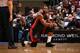 EAST RUTHERFORD,NJ - MARCH 20: Dwyane Wade #3 of the Miami Heat takes a knee during the game against the New Jersey Nets on March 20, 2009 at the Izod Center in East Rutherford, New Jersey. NOTE TO USER: User expressly acknowledges and agrees that, by d