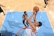 DENVER, CO - NOVEMBER 5: JaVale McGee #34 of the Denver Nuggets goes up for the reverse dunk against the San Antonio Spurs on November 5, 2013 at the Pepsi Center in Denver, Colorado. NOTE TO USER: User expressly acknowledges and agrees that, by downloadi