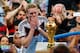 RIO DE JANEIRO, BRAZIL - JULY 13: Andre Schuerrle of Germany looks at the World Cup trophy after defeating Argentina 1-0 in extra time during the 2014 FIFA World Cup Brazil Final match between Germany and Argentina at Maracana on July 13, 2014 in Rio de
