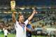 July 13, 2014; Rio de Janeiro, BRAZIL; Germany midfielder Mario Gotze (19) celebrates with the world cup trophy after the championship match of the 2014 World Cup against the Argentina at Maracana Stadium. Germany won 1-0. Mandatory Credit: Tim Groothuis