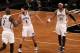 May 2, 2014; Brooklyn, NY, USA; Brooklyn Nets center Kevin Garnett (2), guard Deron Williams (8) and forward Paul Pierce (34) celebrate against the Toronto Raptors during the second half in game six of the first round of the 2014 NBA Playoffs at Barclays