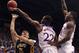LAWRENCE, KS - DECEMBER 30: Jordan Lauf #25 of the Toledo Rockets shoots over Andrew Wiggins #22 and Jamari Traylor #31 of the Kansas Jayhawks in the second half at Allen Fieldhouse on December 30, 2013 in Lawrence, Kansas. (Photo by Ed Zurga/Getty Image