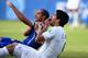 NATAL, BRAZIL - JUNE 24: Luis Suarez of Uruguay and Giorgio Chiellini of Italy react after a clash during the 2014 FIFA World Cup Brazil Group D match between Italy and Uruguay at Estadio das Dunas on June 24, 2014 in Natal, Brazil. (Photo by Matthias H