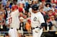 MINNEAPOLIS, MN - JULY 15: American League All-Star Miguel Cabrera #24 of the Detroit Tigers celebrates with Mike Trout #27 of the Los Angeles Angels after hitting a home run in the first inning against the National League All-Stars during the 85th MLB A