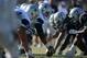 Aug 12, 2014; Oxnard, CA, USA; General view of the line of scrimmage as Dallas Cowboys center Mackenzy Bernadeau snaps the ball at scrimmage against the Oakland Raiders at River Ridge Fields. Mandatory Credit: Kirby Lee-USA TODAY Sports