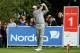 AALBORG, DENMARK - AUGUST 14: Thomas Bjorn of Denmark hits his tee-shot on the first hole during the first round of the Made In Denmark at Himmerland Golf & Spa Resort on August 14, 2014 in Aalborg, Denmark. (Photo by Andrew Redington/Getty Images)