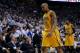 May 24, 2014; Miami, FL, USA; Indiana Pacers forward David West (21) and forward Paul George (24) walk off the court following game three of the Eastern Conference Finals of the 2014 NBA Playoffs at American Airlines Arena. Miami Heat defeated the Indiana