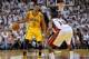 May 30, 2014; Miami, FL, USA; Indiana Pacers guard George Hill (3) brings the ball up against Miami Heat guard Mario Chalmers (15) during the second half in game six of the Eastern Conference Finals of the 2014 NBA Playoffs at American Airlines Arena. Man