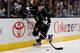 LOS ANGELES, CA - NOVEMBER 9: Jake Muzzin #6 of the Los Angeles Kings skates with the puck against the Vancouver Canucks at Staples Center on November 9, 2013 in Los Angeles, California. (Photo by Noah Graham/NHLI via Getty Images)