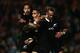 HAMILTON, NEW ZEALAND - JUNE 21: Aaron Smith of the All Blacks celebrates with Ma'a Nonu and Aaron Cruden after scoring his second try during the International Test match between the New Zealand All Blacks and England at Waikato Stadium on June 21, 2014