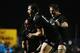 HAMILTON, NEW ZEALAND - JUNE 21: Aaron Smith of the All Blacks celebrates with Ben Smith and Richie McCaw after scoring a try during the International Test match between the New Zealand All Blacks and England at Waikato Stadium on June 21, 2014 in Hamilt