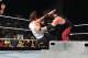Kane chokeslams Dean Ambrose.
