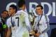 CARDIFF, WALES - AUGUST 12: Real Madrid players James Rodriguez (l) Ronaldo and Gareth Bale (r) share a joke after the UEFA Super Cup match between Real Madrid and Sevilla FC at Cardiff City Stadium on August 12, 2014 in Cardiff, Wales. (Photo by Stu F